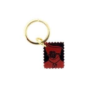 Red, black and gold DOMESTIQUE key ring at BRIGADE MONDAINE