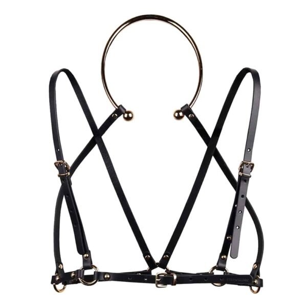 Black leather bondage harness Amata from Elif Domanic. This harness is designed with black leather straps and thin silver buckles. The harness is worn by means of a rigid and circular choker with an opening for the front of the neck, the straps are hooked to it with small nails and form the chest, the straps and the support of the underside of the chest.