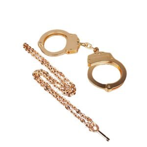 BDSM handcuffs from the brand Elif Domanic. These handcuffs are gold coloured and have a key with a long chain.