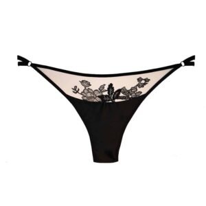 Raël thong from the brand Hervé by Celine Marie in black colour. This thong is provided with fine soft velvet elastics adjustable by small hooks and rings in 24 carat gold plated. The front part that hides the genitals is a piece of fabric quite large in transparent illusion mesh and fine lace, at the back is a double elastic on the lower back and finally the string.
