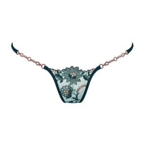 Here you can see the Bijou Royal Meadows Thong from the brand LUCKY CHEEKS. The front is made of green tulle. On top of it green flowers are sewn. On these flowers there are bronze details. On the hips, the chains are also bronze.