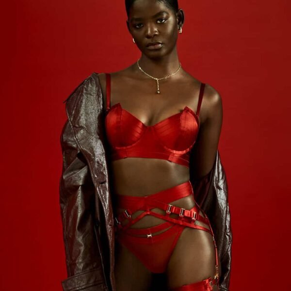 Signature bordelle suspender belt in burnt red with 24-carat finish. An essential accessory for a luxurious silhouette