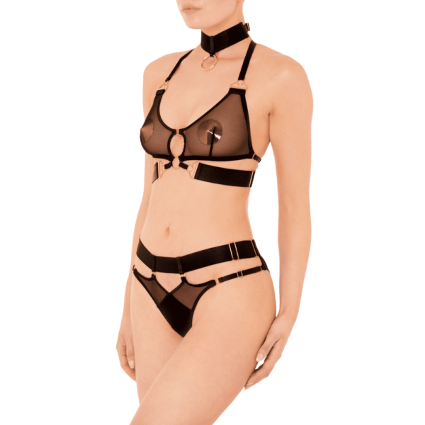 The Kora Noir collection by Bordelle on Brigade Mondaine is directly inspired by the story of Persephone. Also known as Kora, goddess of spring and queen of the underworld. Kora is personified by the constellation Virgo in Greek mythology. Kora revives the DNA of Bordelle, strong contrasts between soft, electric and luxurious materials. Lingerie pieces to be worn day and night, on top and underneath... Bold chameleon designs, strong and powerful lingerie that must be seen by all, like an armor. Kora is a line of lingerie with contemporary and versatile shapes; its pieces are mostly made of removable elements to be worn in a multitude of ways. Kora is handcrafted from satin elastic straps, 24 karat gold plated hardware, wide band elastic and luxuriously soft plain mesh.