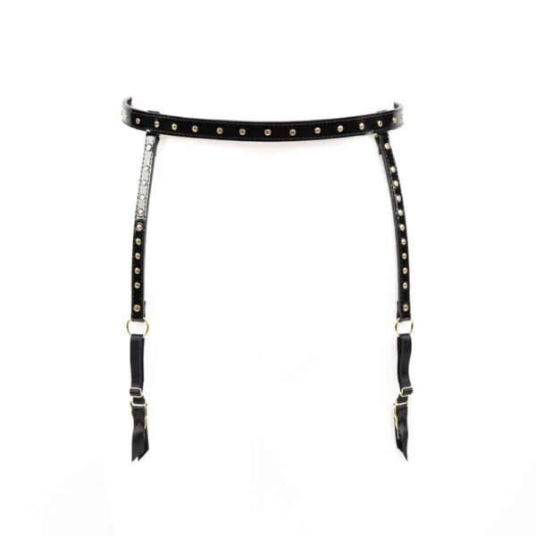 Increase your sex appeal and make men go crazy with desire with this Ricco suspender belt. Belt style, this piece is molded in high quality Italian patent leather and embellished with golden brass rivets. A chic creation with removable and adjustable suspenders. To be worn as a belt or garter belt for a high fashion look.